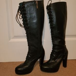 Knee high black leather boots